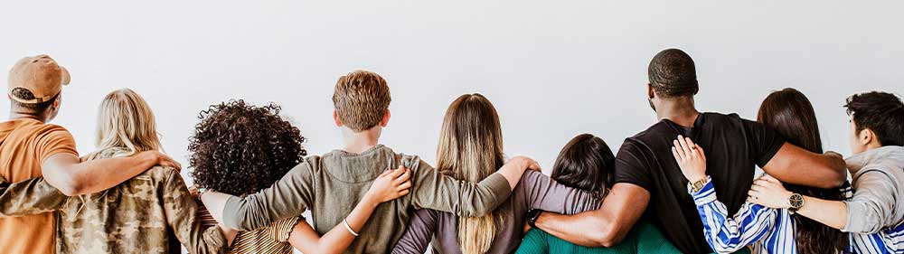 People hugging in a row. 