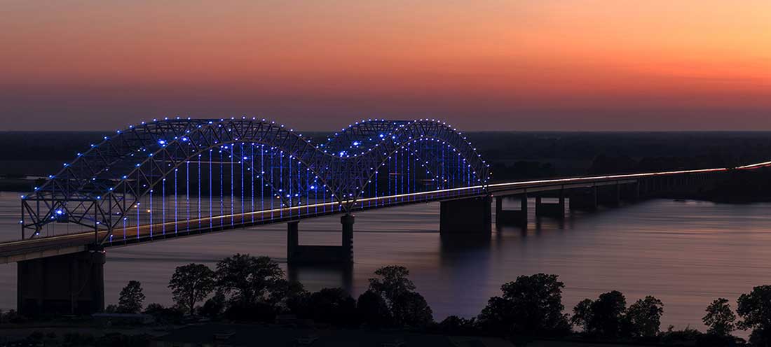 The Memphis City Bridge at night.