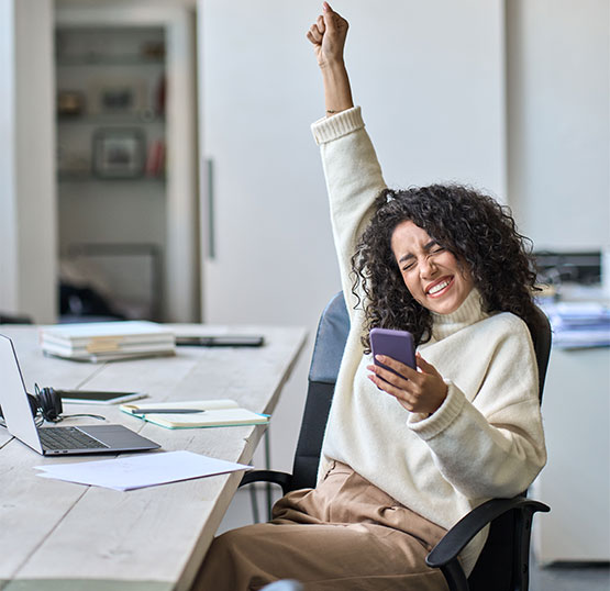 Woman raising her hand in excitement.